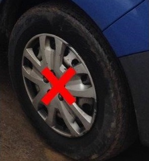 wheel with embellisher or hub cap